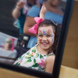 Smile and Paint Face Painting - One very happy Rainbow Unicorn