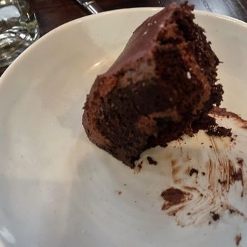 Red Owl Tavern - Rich and moist chocolate cake. Almost forgot to get the picture. Super yummy! - New American Near Me - Philadelphia, Pennsylvania Red Owl Tavern - Rich and moist chocolate cake. Almost forgot to get the picture. Super yummy! - New American Near Me - Philadelphia, Pennsylvania