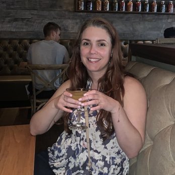 Arkadia Grill - My babes with an excellent rum drink.  Forgot the name. - Burgers Near Me - Miami Beach, Florida