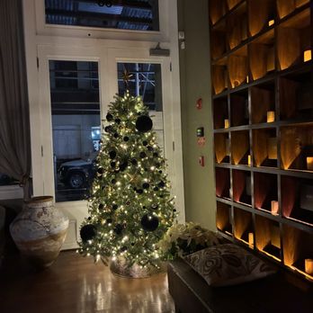 Aire Ancient Baths - New York - The Lobby wall of a hundred candles, LUV It! - Massage Near Me - New York, New York