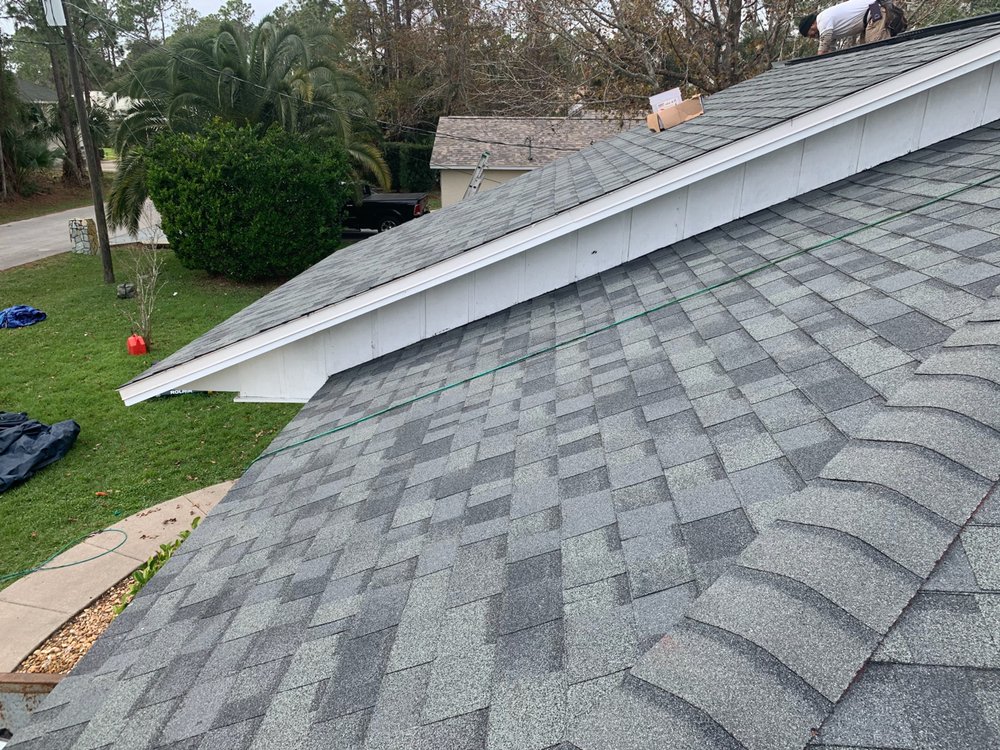 Slide of EZ Roofing of Flagler County