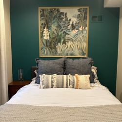 "Framed" wallpaper in guest bedroom.