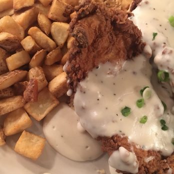 Mayfel's - Fried chicken biscuit with home fries - Southern Near Me - Asheville, North Carolina