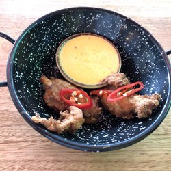 Rude Boy - Mango salsa sauce with rib on Tuesday special  $1 rib - I should order 10 ribs instead  So good