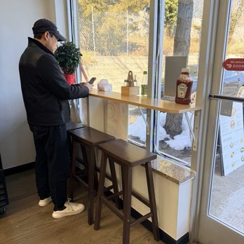 JSnack Mart - Small seating area - International Grocery Near Me - Glen Head, New York