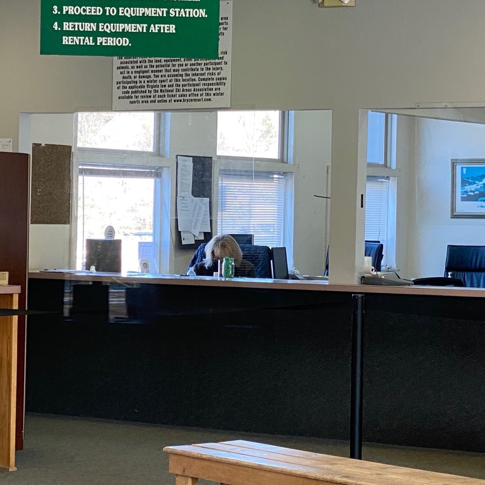One of the cashiers. One of the cashiers.