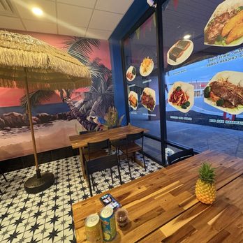 Kaukau Hawaiian BBQ - Decor/dining room (they have 3 tables) - Hawaiian Near Me - Speedway, Indiana Kaukau Hawaiian BBQ - Decor/dining room (they have 3 tables) - Hawaiian Near Me - Speedway, Indiana