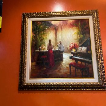 Ceviche House - a painting of a family sitting at a piano - Seafood Near Me - Orlando, Florida Ceviche House - a painting of a family sitting at a piano - Seafood Near Me - Orlando, Florida