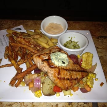 Fire By The Monon - Salmon "large plate" with grilled vegetables and sweet potato fries. - American Near Me - Indianapolis, Indiana