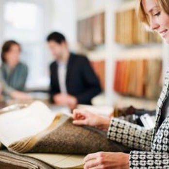 Giant Carpet Flooring Centre - a woman sitting at a table in a large room - Flooring Near Me - Barrie, Ontario Giant Carpet Flooring Centre - a woman sitting at a table in a large room - Flooring Near Me - Barrie, Ontario
