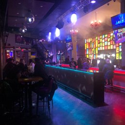 people sitting at the bar