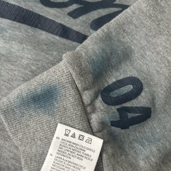 Brixton - Care instructions, and ruined sweatshirt.