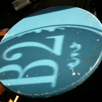 B2 - This awesome image was formed by the light coming through the frosted logo on the window onto our table. - Coffee & Tea Near Me - Philadelphia, Pennsylvania B2 - This awesome image was formed by the light coming through the frosted logo on the window onto our table. - Coffee & Tea Near Me - Philadelphia, Pennsylvania