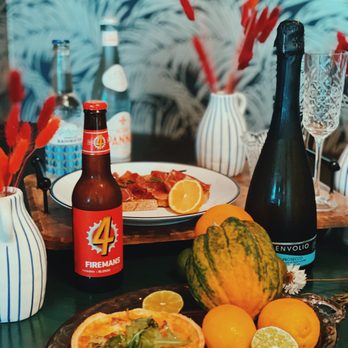 The Eldorado - a plate of food and a bottle of beer - Cafes Near Me - Lockhart, Texas