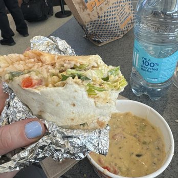 QDOBA Mexican Eats - Veggie burrito and queso and water bottle 22$ - Mexican Near Me - Detroit, Michigan QDOBA Mexican Eats - Veggie burrito and queso and water bottle 22$ - Mexican Near Me - Detroit, Michigan