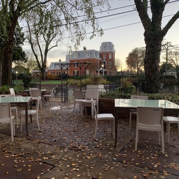Root & Vine - tables and chairs in a courtyard - New American Near Me - Morganton, North Carolina Root & Vine - tables and chairs in a courtyard - New American Near Me - Morganton, North Carolina