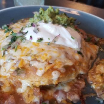Santo - Smothered Quesadillas Montadas. - New Mexican Cuisine Near Me - Boulder, Colorado
