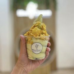 iSee Cream - Matcha Soft Serve Ice Cream in a cup topped with Corn Flakes