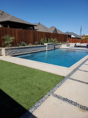 zeroscape backyard - full back yard install including artificial turf, block wall planters, outdoor kitch/lounge, cedar fence.