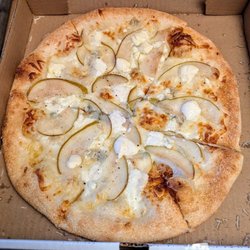 916 Stone Oven Pizza - Quattro Formaggi Pizza - Mozzarella, gorgonzola, goat cheese, ricotta, and sliced pear. Fresh grated Parmesan