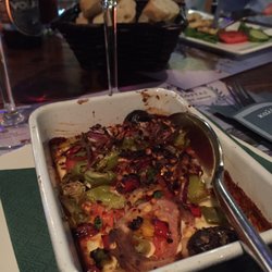 Kostas de Griek - Feta cheese baked with vegetables - served as an appetizer