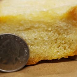 Every surface of the huge garlic bread is covered in garlic butter