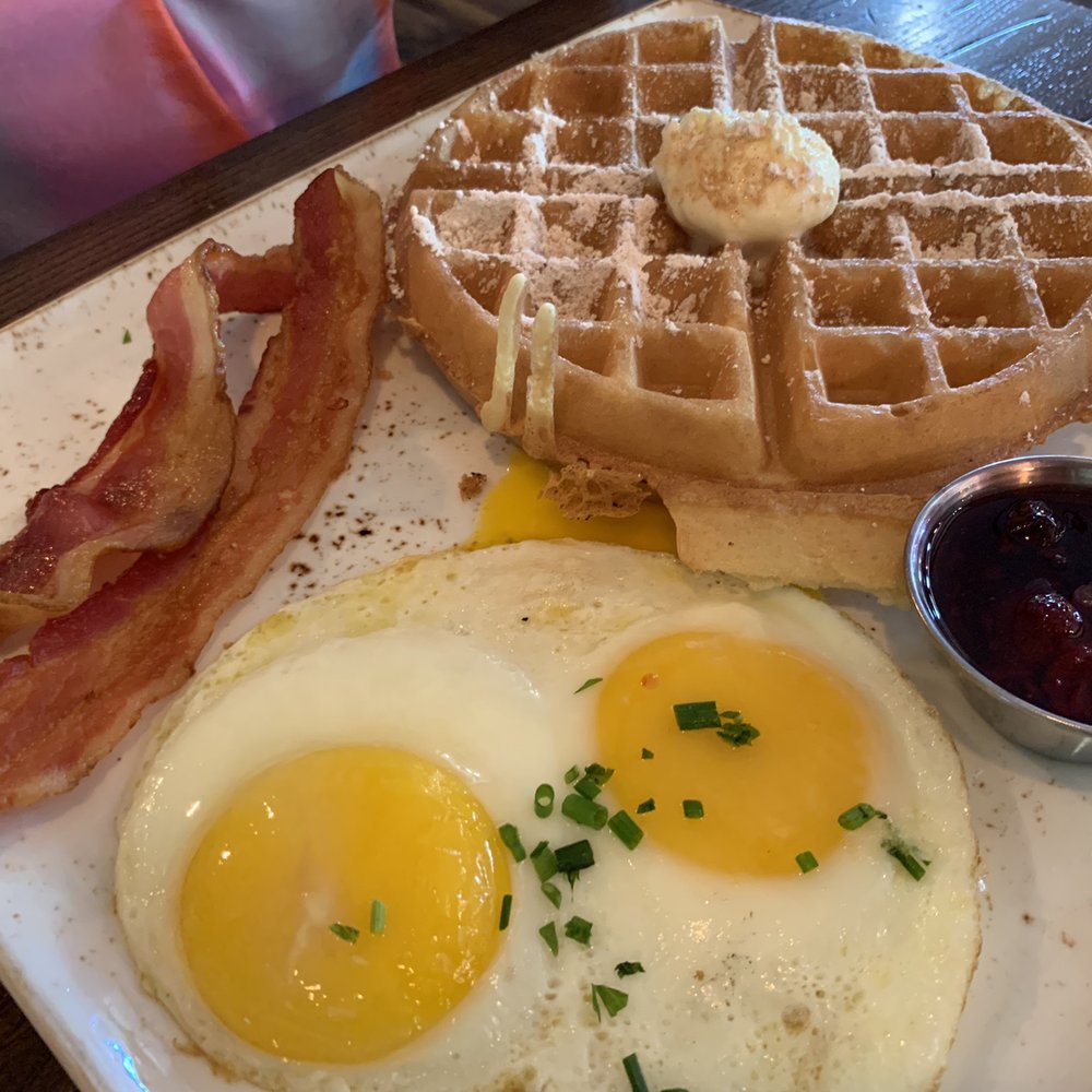 First Watch - Belgian waffle with two sunny side up and bacon - Breakfast & Brunch Near Me - Phoenix, Arizona First Watch - Belgian waffle with two sunny side up and bacon - Breakfast & Brunch Near Me - Phoenix, Arizona