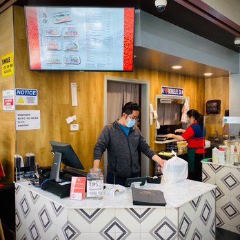 Yin Ji Chang Fen - Berkeley - a man and a woman ordering food - Cantonese Near Me - Berkeley, California Yin Ji Chang Fen - Berkeley - a man and a woman ordering food - Cantonese Near Me - Berkeley, California