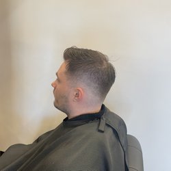 The Kingsman Grooming Studio - Medium skin fade cut by Lori