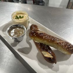 The Tavern - Pretzel sticks with home made queso and beer mustard! So good!!!!