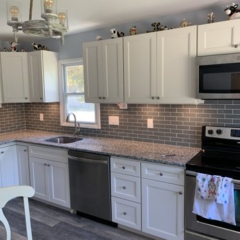 Ashley Construction - a kitchen with stainless steel appliances - General Contractors Near Me - Vineland, New Jersey Ashley Construction - a kitchen with stainless steel appliances - General Contractors Near Me - Vineland, New Jersey