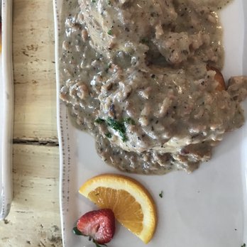Egg - Biscuit with gravy (gravy has ground meat) - Breakfast & Brunch Near Me - Rehoboth Beach, Delaware