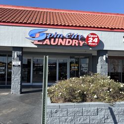 Spin City Laundry - Laundromat name.