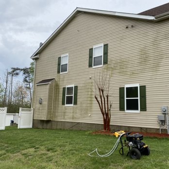 Rileys Applying Pressure - Side of a house before the touch hit it - Pressure Washers Near Me