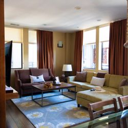 Two Thirty-Five Luxury Suites - Orchard suite.  Open kitchen/dining and living space.