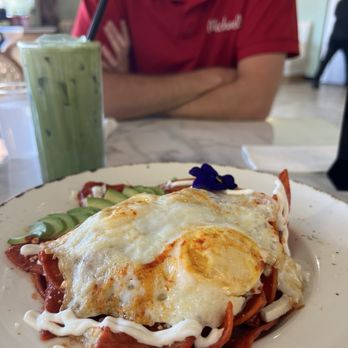 Luua Caffe - Chilaquiles with over easy eggs and matcha latte with honey. - Breakfast & Brunch Near Me - Inglewood, California Luua Caffe - Chilaquiles with over easy eggs and matcha latte with honey. - Breakfast & Brunch Near Me - Inglewood, California