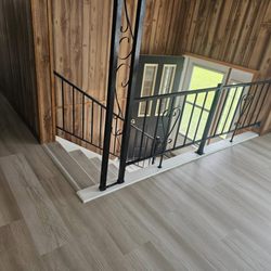 Hayes Services - New flooring with stairs throughout the house