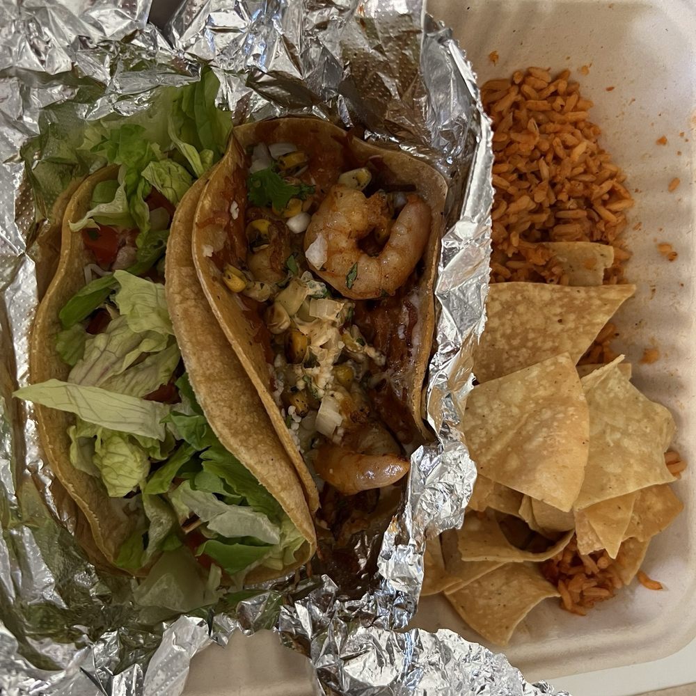 Classic Chicken and Mexican Street taco with chips and rice Classic Chicken and Mexican Street taco with chips and rice
