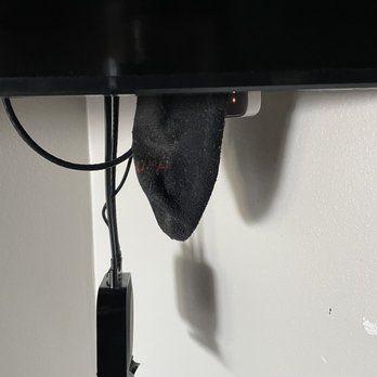 Taos Motor Lodge - Sock hanging behind TV - Hotels Near Me - Ranchos De Taos, New Mexico Taos Motor Lodge - Sock hanging behind TV - Hotels Near Me - Ranchos De Taos, New Mexico