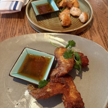 Turtle Tower - Fried chicken wings, complimentary sample of fried cuttlefish patty and fried shrimp wrapped in wonton paper - Vietnamese Near Me - San Francisco, California Turtle Tower - Fried chicken wings, complimentary sample of fried cuttlefish patty and fried shrimp wrapped in wonton paper - Vietnamese Near Me - San Francisco, California
