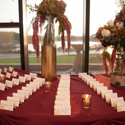 Relish Events at Independence Grove - Place card table.  Photo by Jolie Images, Floral arrangements by A Floral Design