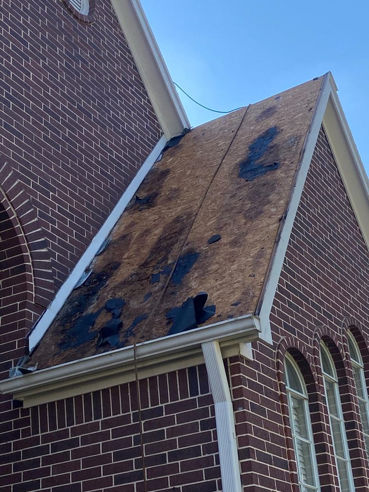 Slide of Derwin's Roofing