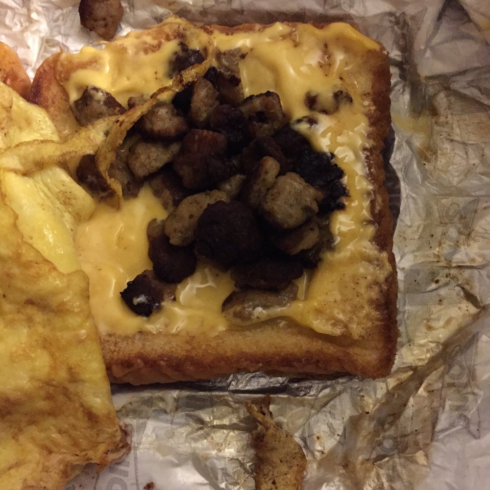 This is what I got for sausage on both sandwiches. Look like they where trying to portion the scraps out. Very disgusting and shameful. This is what I got for sausage on both sandwiches. Look like they where trying to portion the scraps out. Very disgusting and shameful.