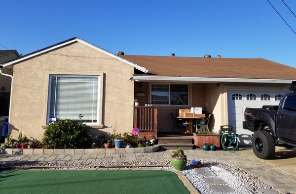 Marroquin's Roofing Logo