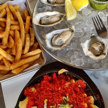 The Dive Oyster Bar - Oysters  HOT CHEETOS TRUFFLE MAC CAJUN TRUFFLE FRIES - Southern Near Me - Irvine, California