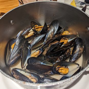 Real Seafood Company Ann Arbor - A large pot of large mussels. - Seafood Near Me - Ann Arbor, Michigan