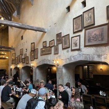 Three Broomsticks - people eating in a restaurant - British Near Me - Orlando, Florida Three Broomsticks - people eating in a restaurant - British Near Me - Orlando, Florida