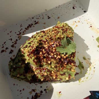 La La Land - Red chili flakes with a side of avocado toast. - Cafes Near Me - Irvine, California La La Land - Red chili flakes with a side of avocado toast. - Cafes Near Me - Irvine, California