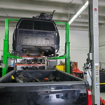 Miami Power Diesel - Ford F350 Cab Lift for new motor swap. - Auto Repair Near Me - Miami, Florida Miami Power Diesel - Ford F350 Cab Lift for new motor swap. - Auto Repair Near Me - Miami, Florida