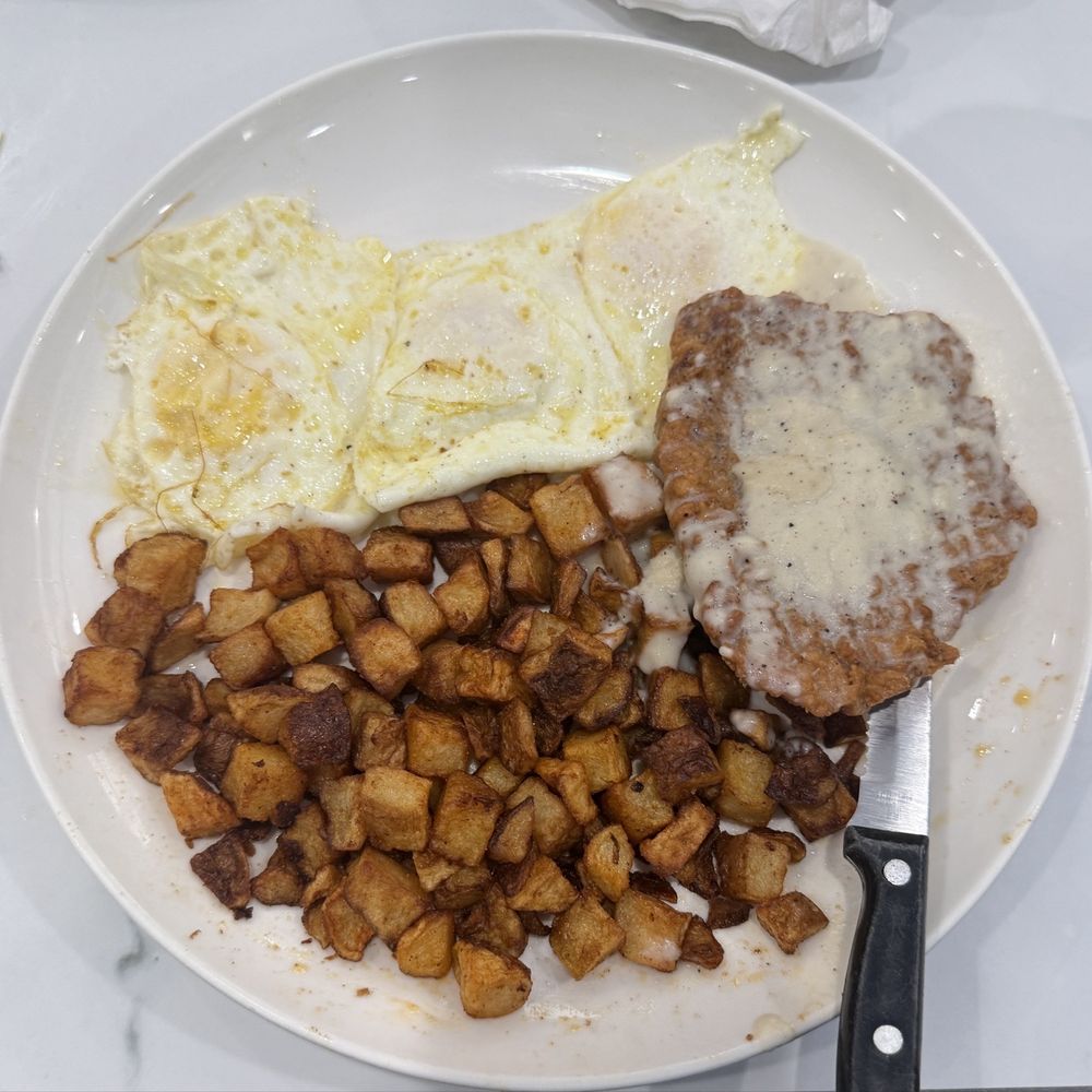 Fried steak and eggs with white gravy